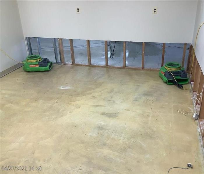 Room with flood cuts and SERVPRO drying equipment