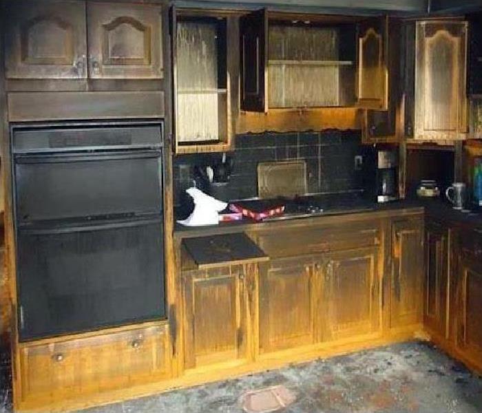 kitchen damaged by fire and smoke